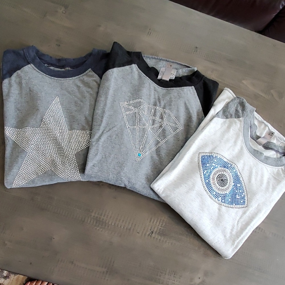 A lot of 3 King of Cole baseball shirts.